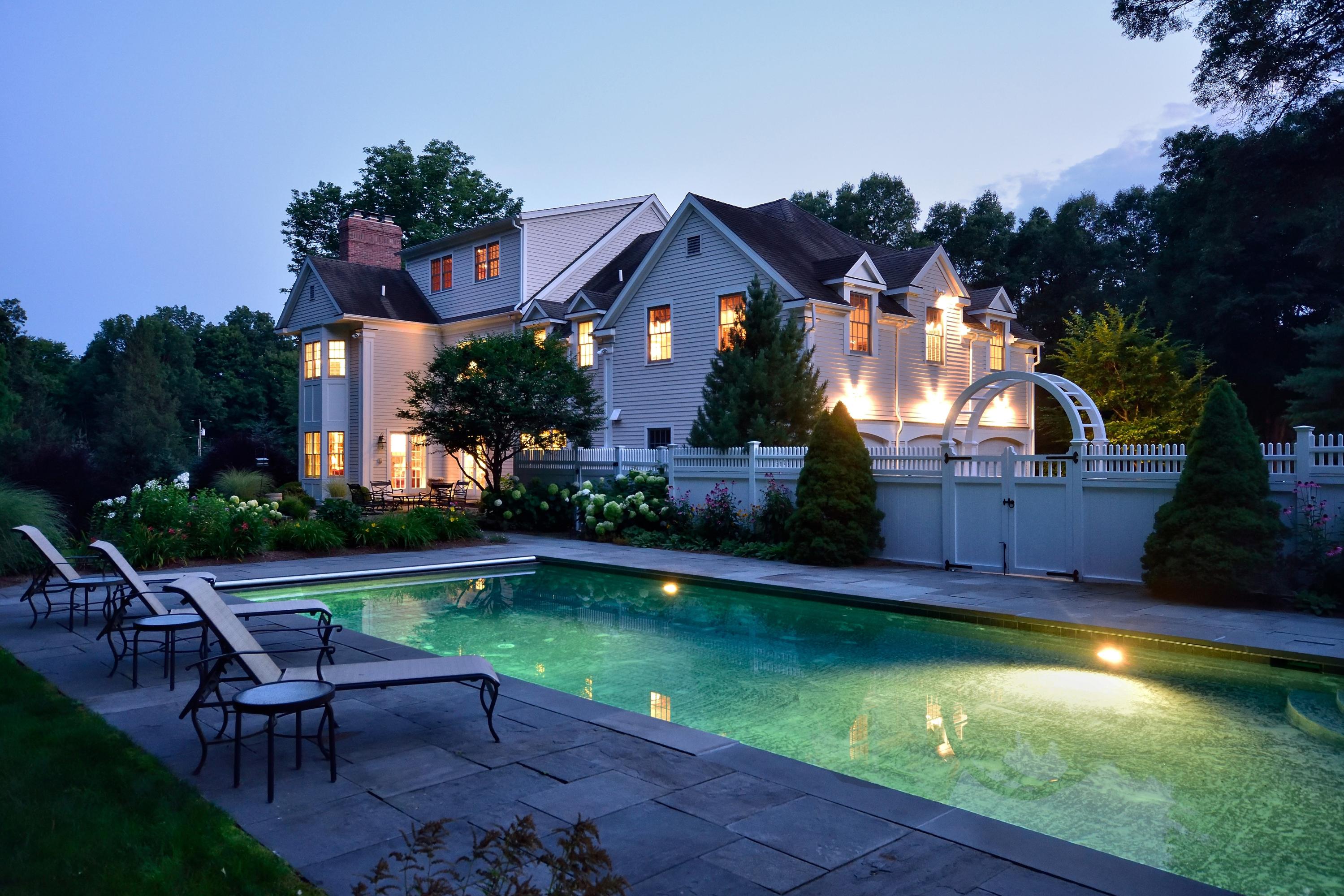 879 Valley Road New Canaan, CT 06840 - Photo 2 of 26 an aerial view of residential house with swimming pool and outdoor seating