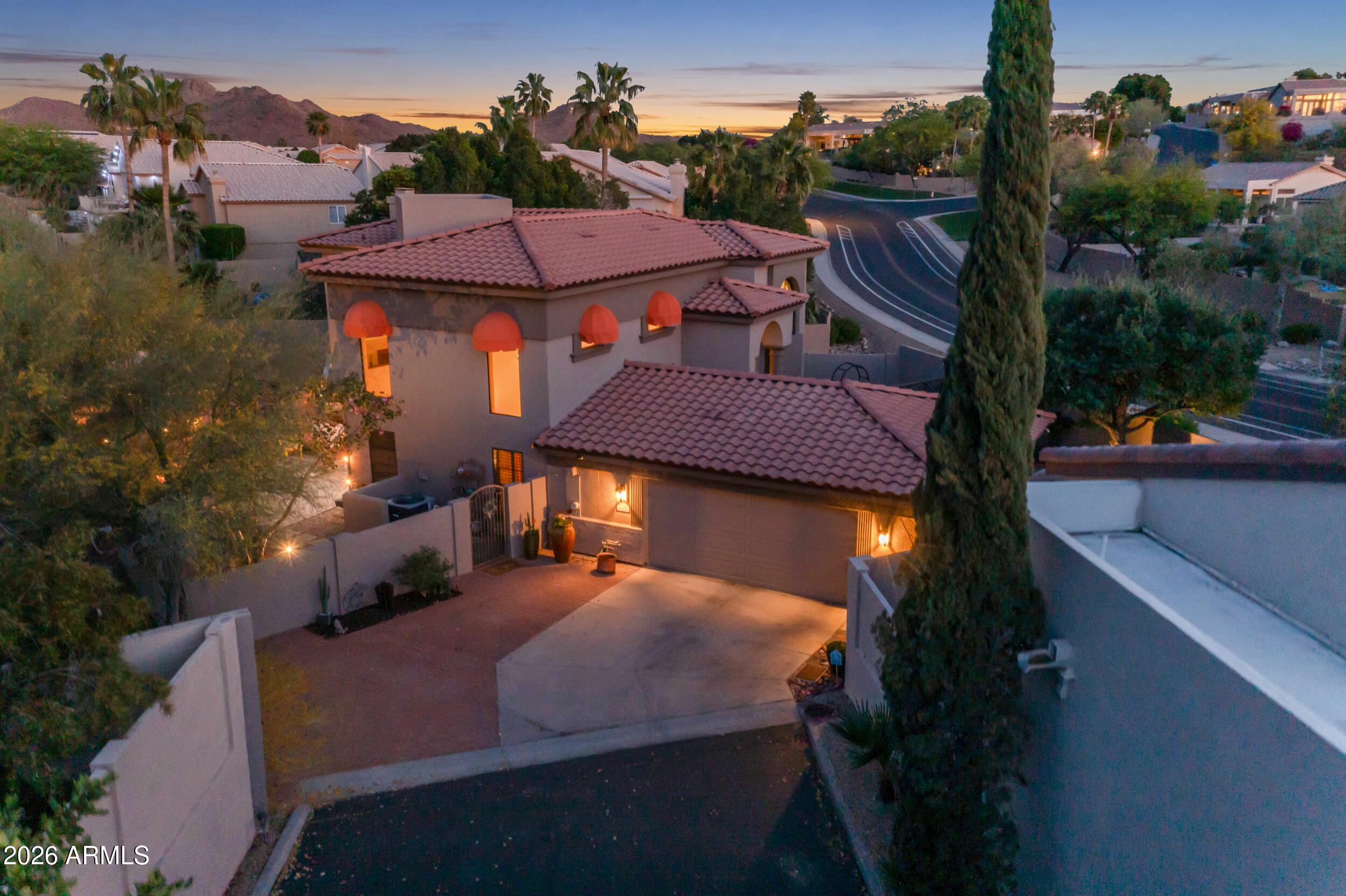 1539 East Winged Foot Road Phoenix, AZ 85022 - Photo 9 of 64 an aerial view of a house with yard table and chairs