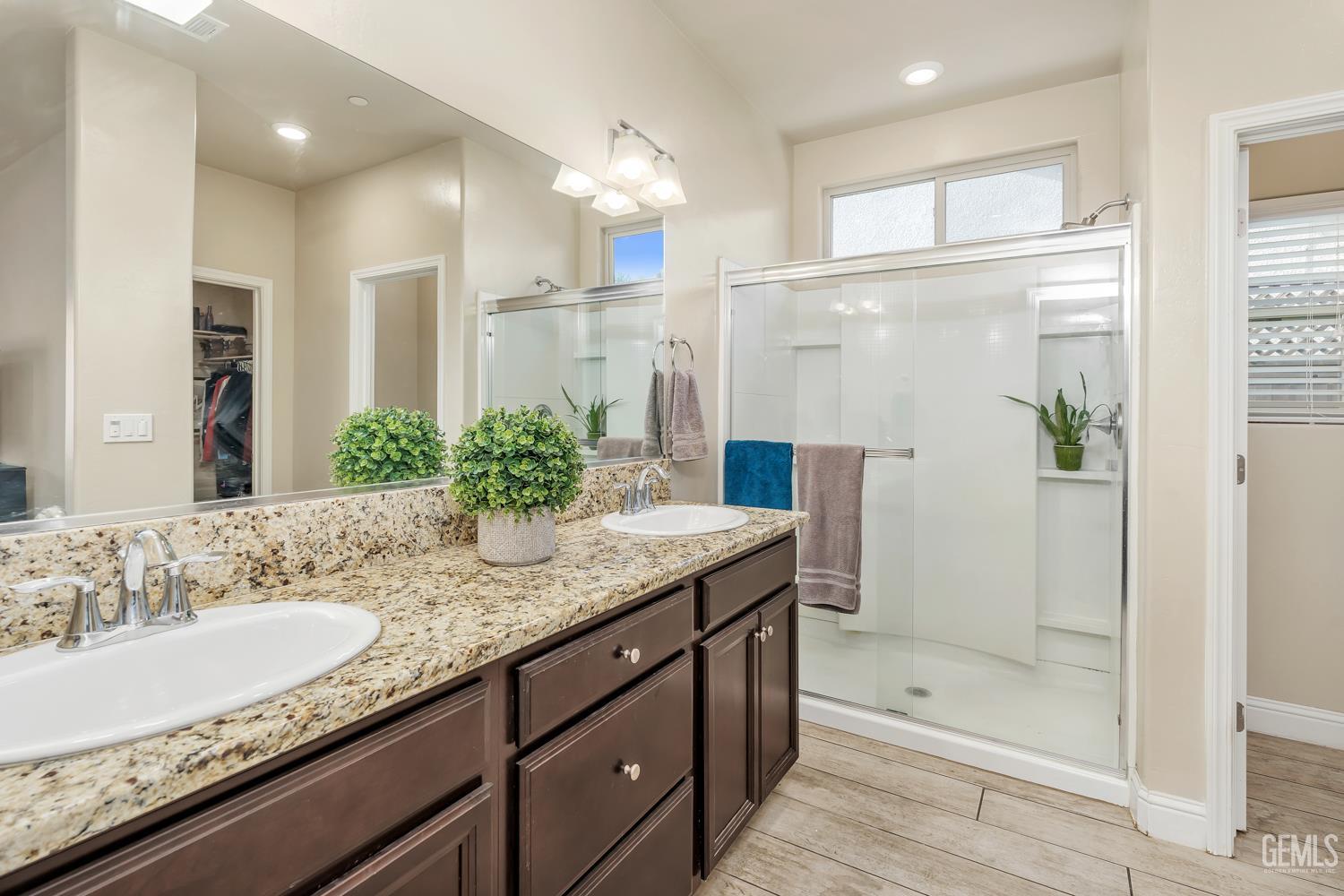 Undisclosed Address Shafter, CA 93263 - Photo 9 of 25 a bathroom with a granite countertop sink shower and a mirror