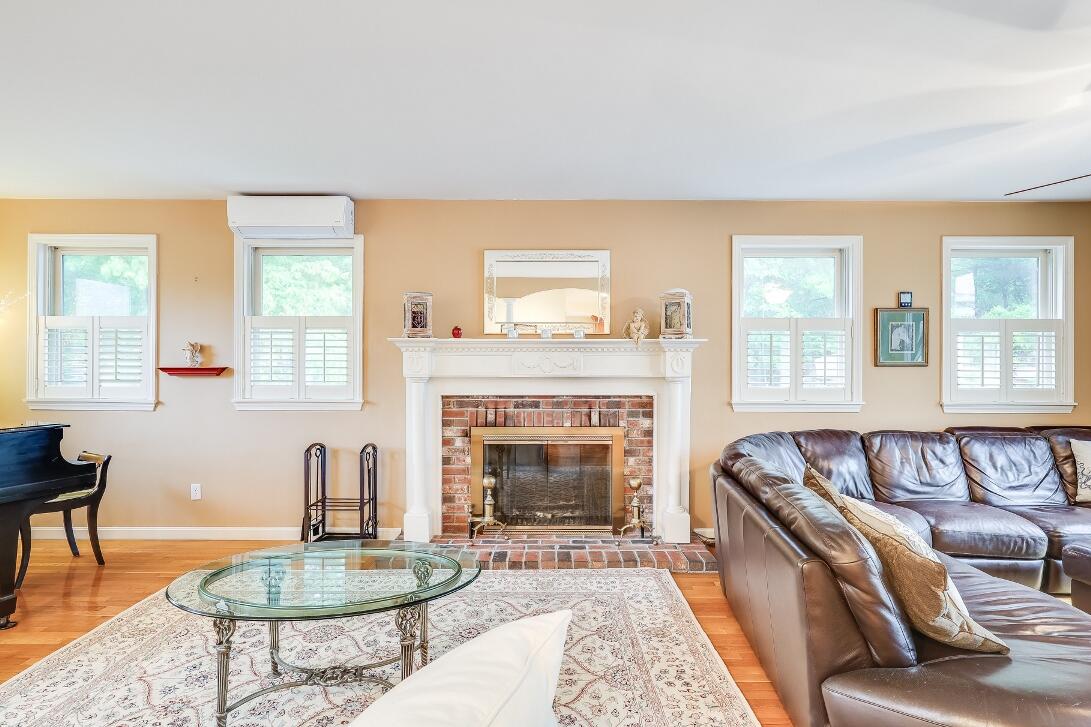 227 Run Hill Road Brewster, MA 02631 - Photo 14 of 89 a living room with furniture and a fireplace