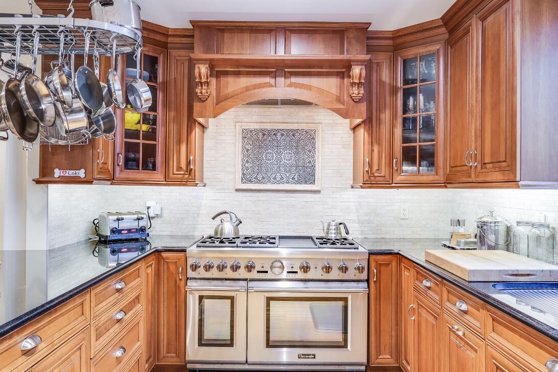 227 Run Hill Road Brewster, MA 02631 - Photo 19 of 89 a view of a kitchen with a stove top oven