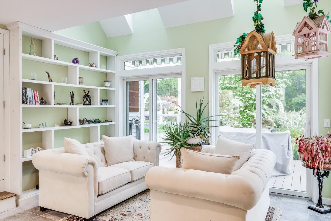 227 Run Hill Road Brewster, MA 02631 - Photo 30 of 89 a living room with furniture and a potted plant