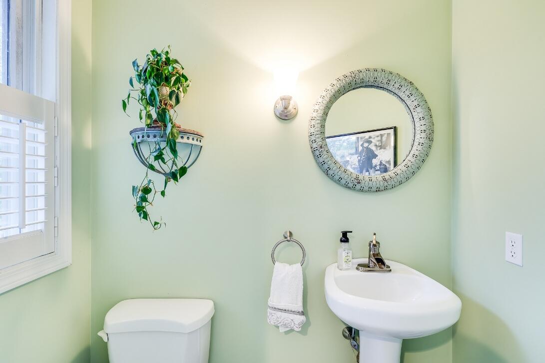 227 Run Hill Road Brewster, MA 02631 - Photo 32 of 89 a bathroom with a toilet sink and mirror