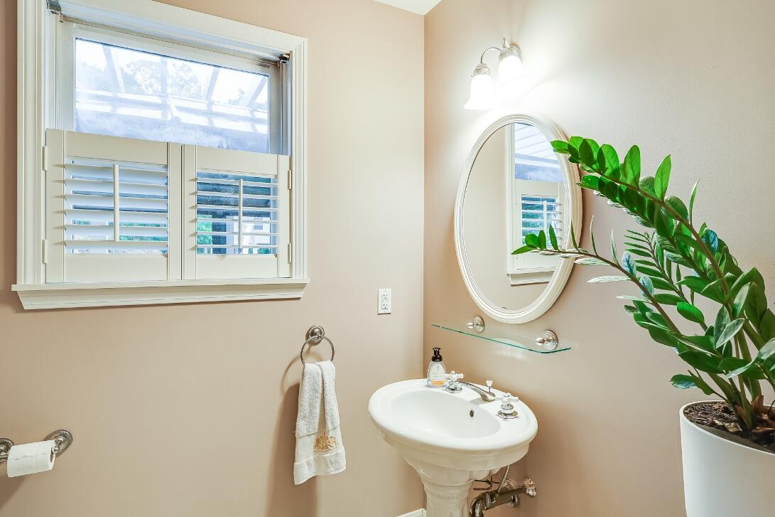 227 Run Hill Road Brewster, MA 02631 - Photo 33 of 89 a bathroom with a sink and a mirror