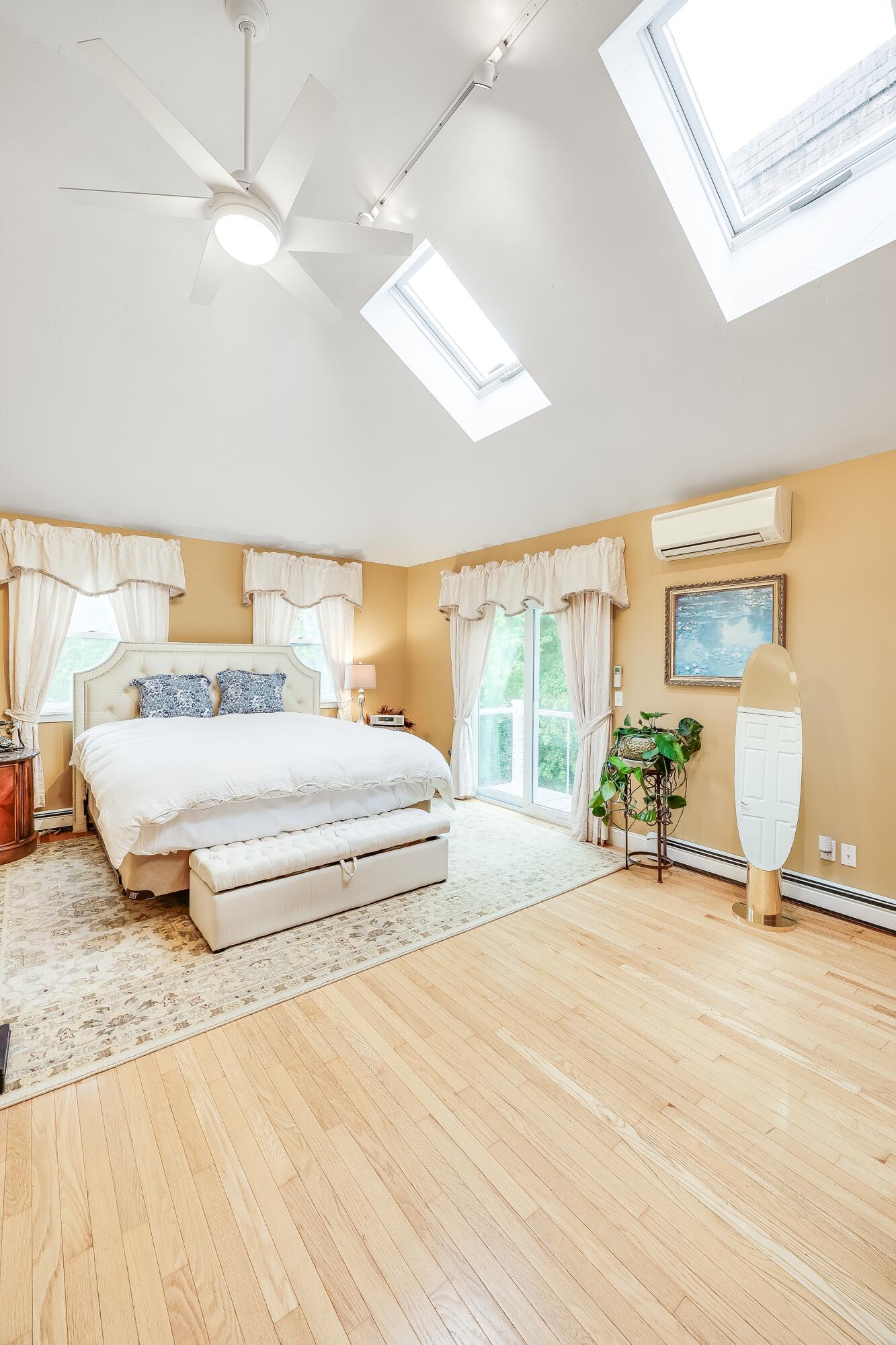 227 Run Hill Road Brewster, MA 02631 - Photo 35 of 89 a bedroom with a bed and large mirror