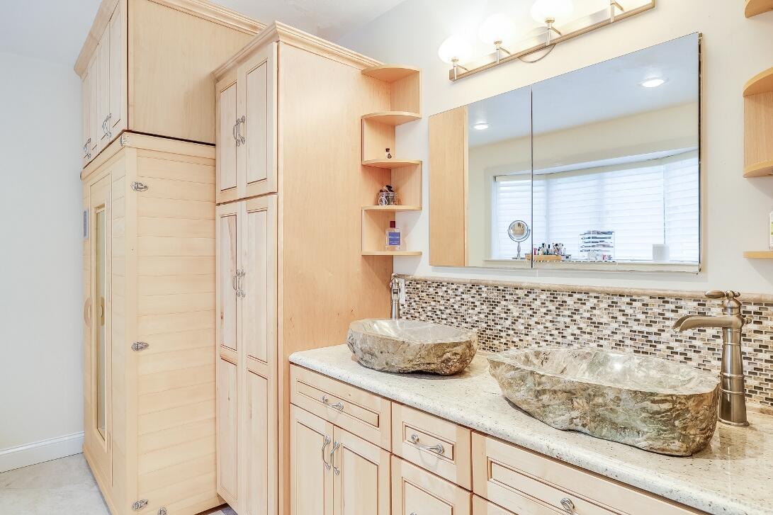227 Run Hill Road Brewster, MA 02631 - Photo 40 of 89 a bathroom with a sink and a mirror