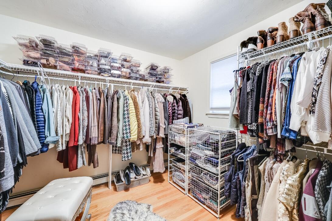 227 Run Hill Road Brewster, MA 02631 - Photo 48 of 89 a view of walk in closet with clothes and shoes