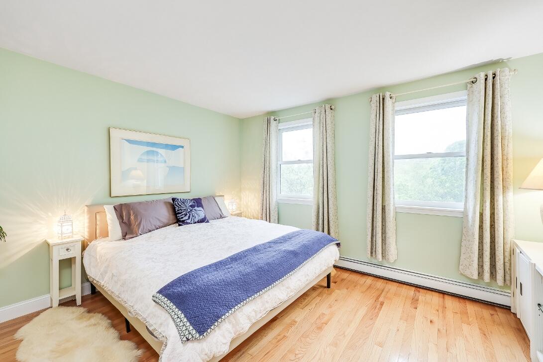 227 Run Hill Road Brewster, MA 02631 - Photo 50 of 89 a bedroom with a bed and a window