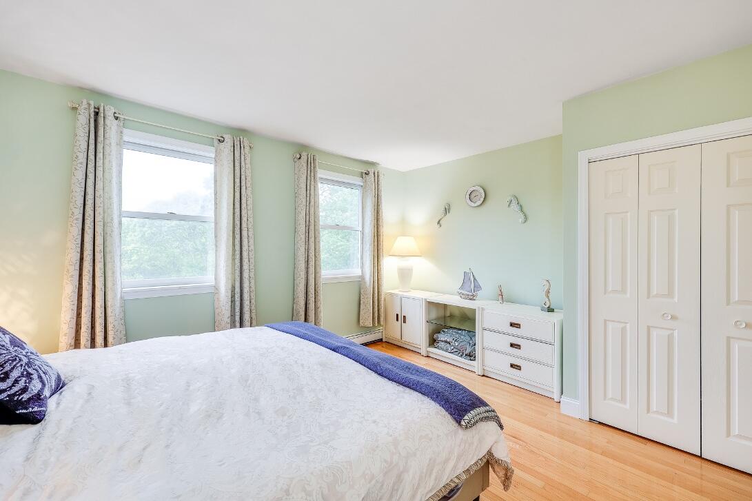 227 Run Hill Road Brewster, MA 02631 - Photo 51 of 89 a bedroom with a bed and a window