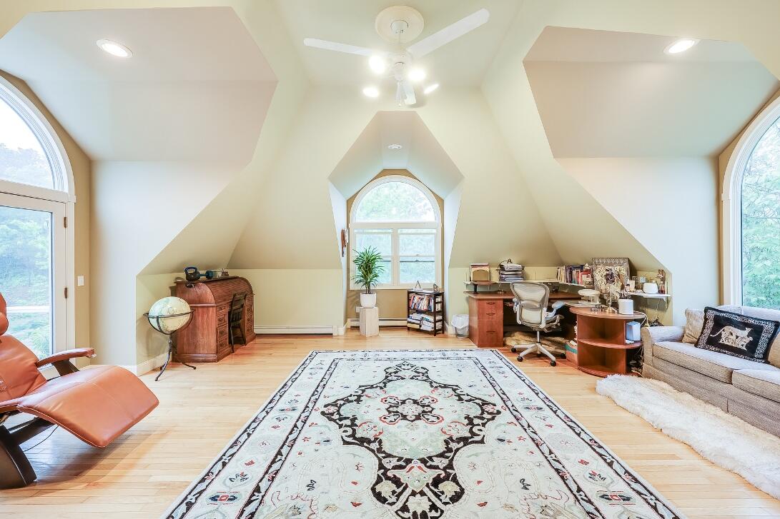 227 Run Hill Road Brewster, MA 02631 - Photo 61 of 89 a bedroom with furniture and a large window