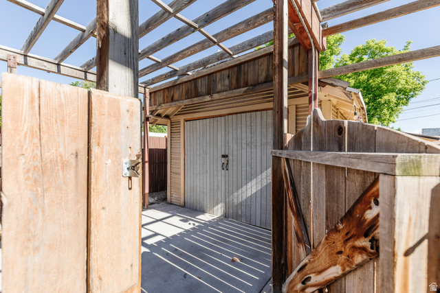 227 West 200 North Logan, UT 84321 - Photo 43 of 44 Enclosed outdoor space featuring a wood pergola and concrete flooring