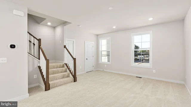 a view of an entryway with stairs