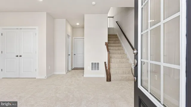 a view of an entryway with staircase
