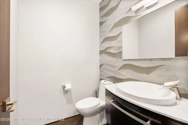 a bathroom with a sink and a toilet