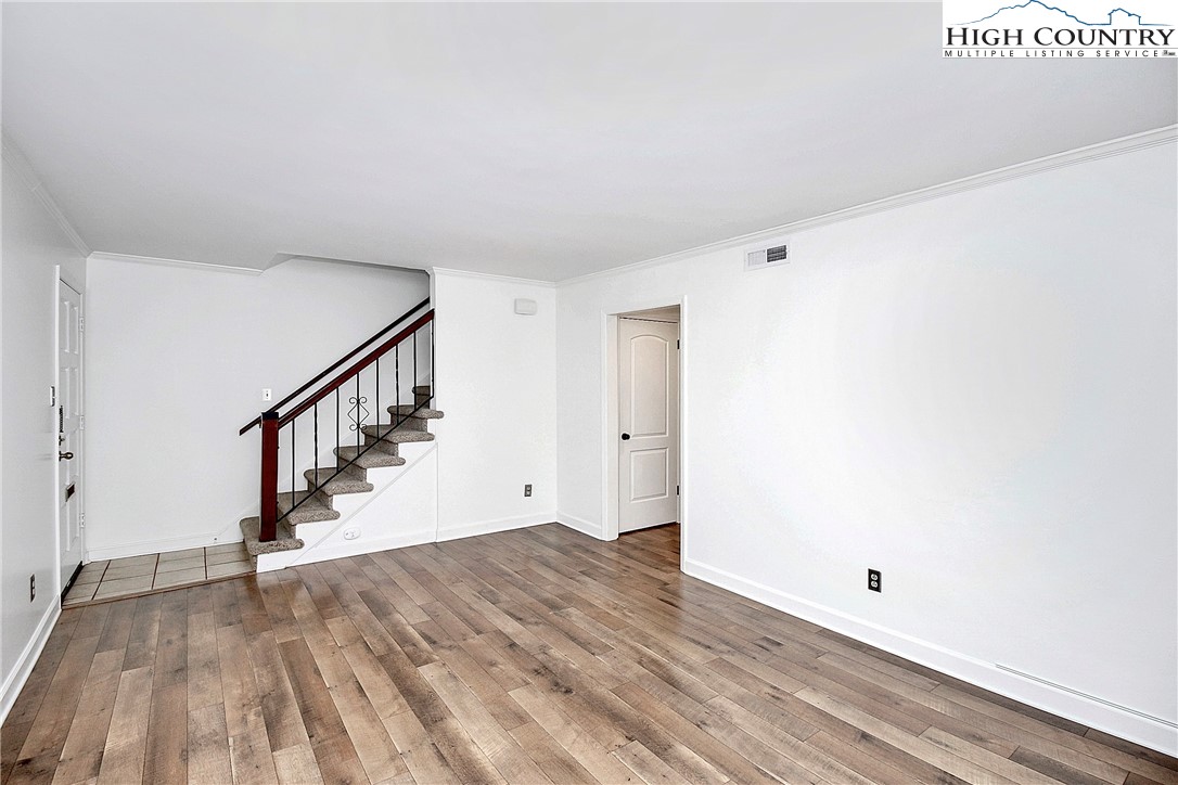 3520 Colony Road, Unit I Charlotte, NC 28211 - Photo 3 of 30 a view of entryway with wooden floor