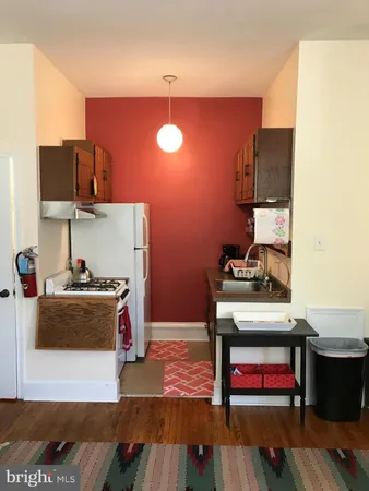 a fireplace with a clock on top of it