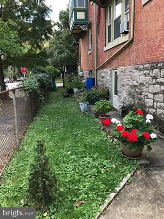 a view of a pathway both side of a building