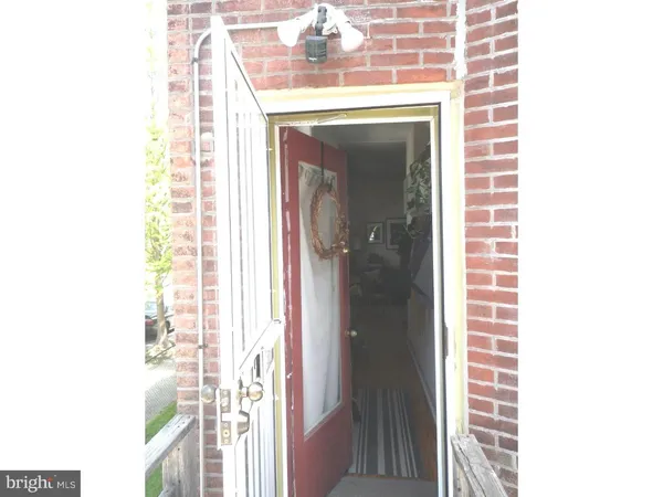 a view of a porch with wooden floor and outer view