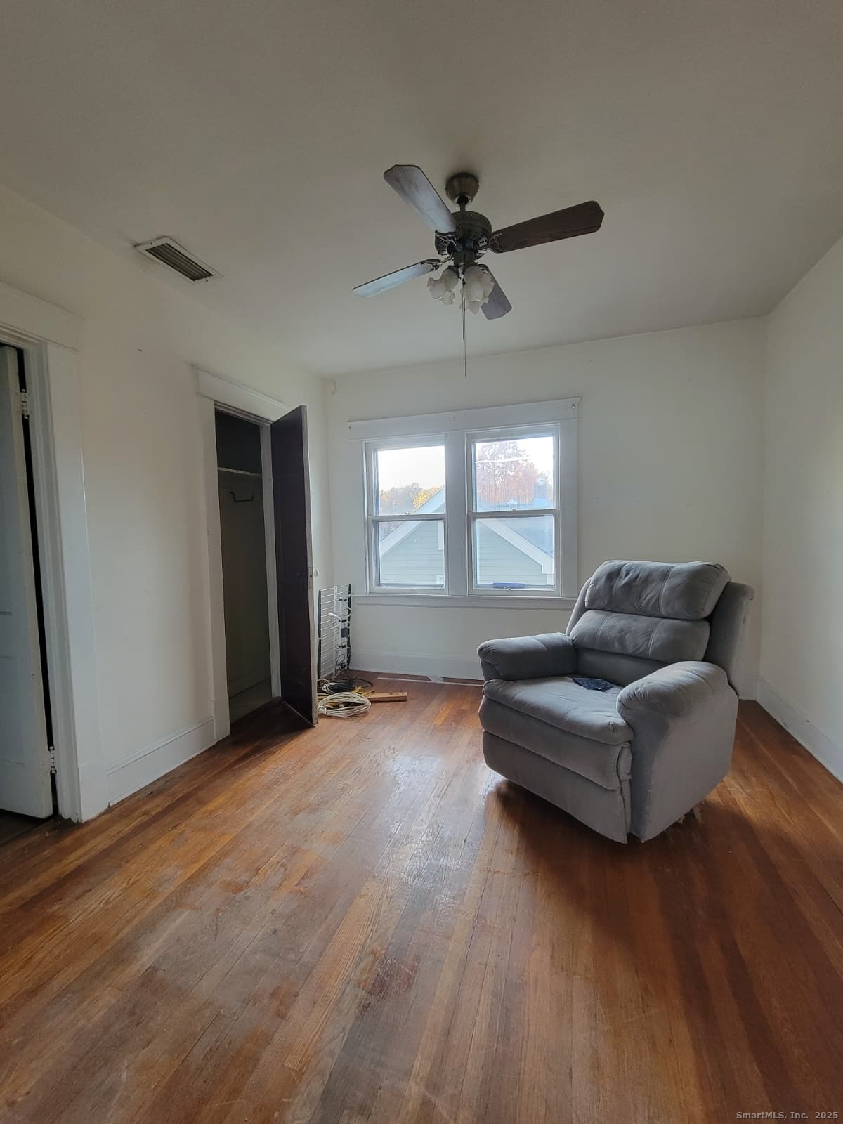 45 Belden Street New Britain, CT 06051 - Photo 10 of 11 a living room with couches and a window