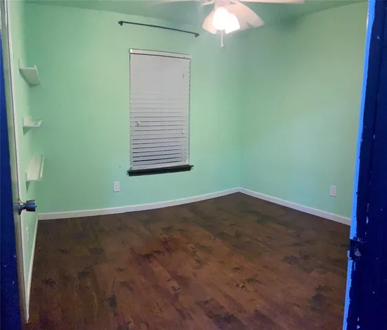 a view of a room that has a window in it