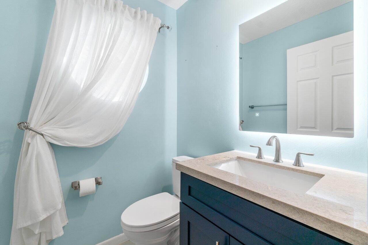 23458 Torre Circle Boca Raton, FL 33433 - Photo 17 of 27 Half bath-first floor