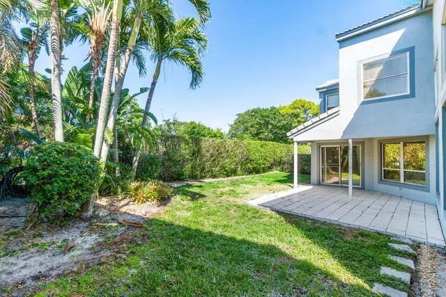 a backyard of a house with seating space