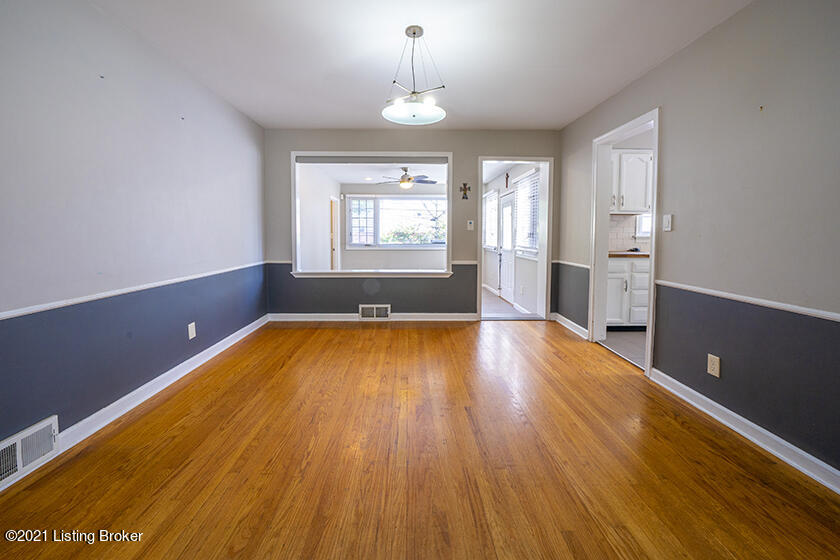 215 Alcott Road Louisville, KY 40207 - Photo 18 of 42 LARGE DINING ROOM WHICH OPENS TO LIVING ROOM AND FLORIDA ROOM