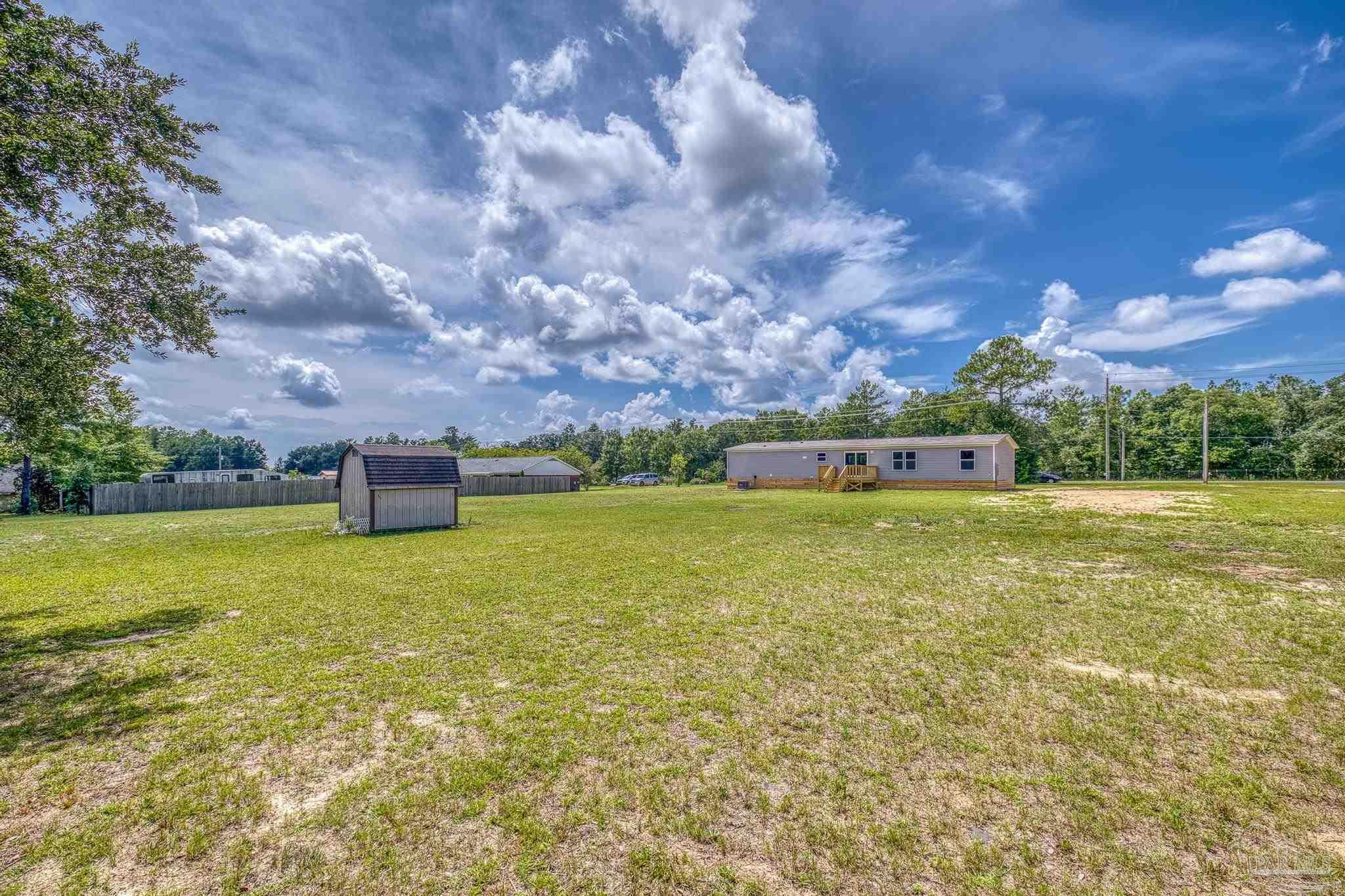 4644 Farm Life Road Milton, FL 32583 - Photo 32 of 39 a picture of a city view