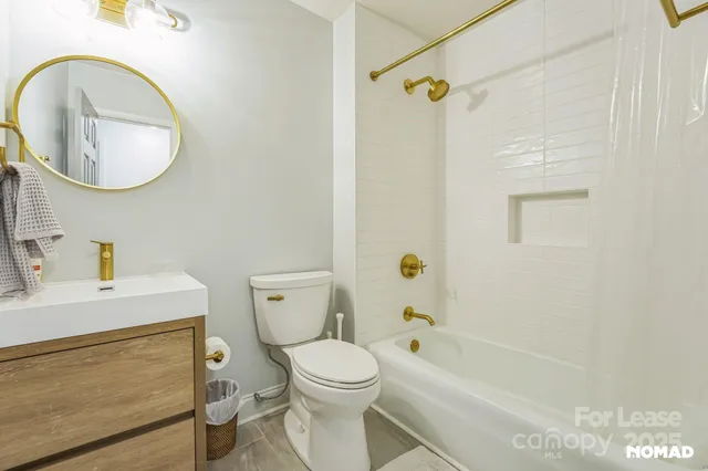 a utility room with sink dryer and washer