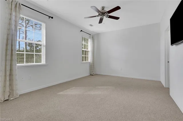 a view of a livingroom with a flat screen tv