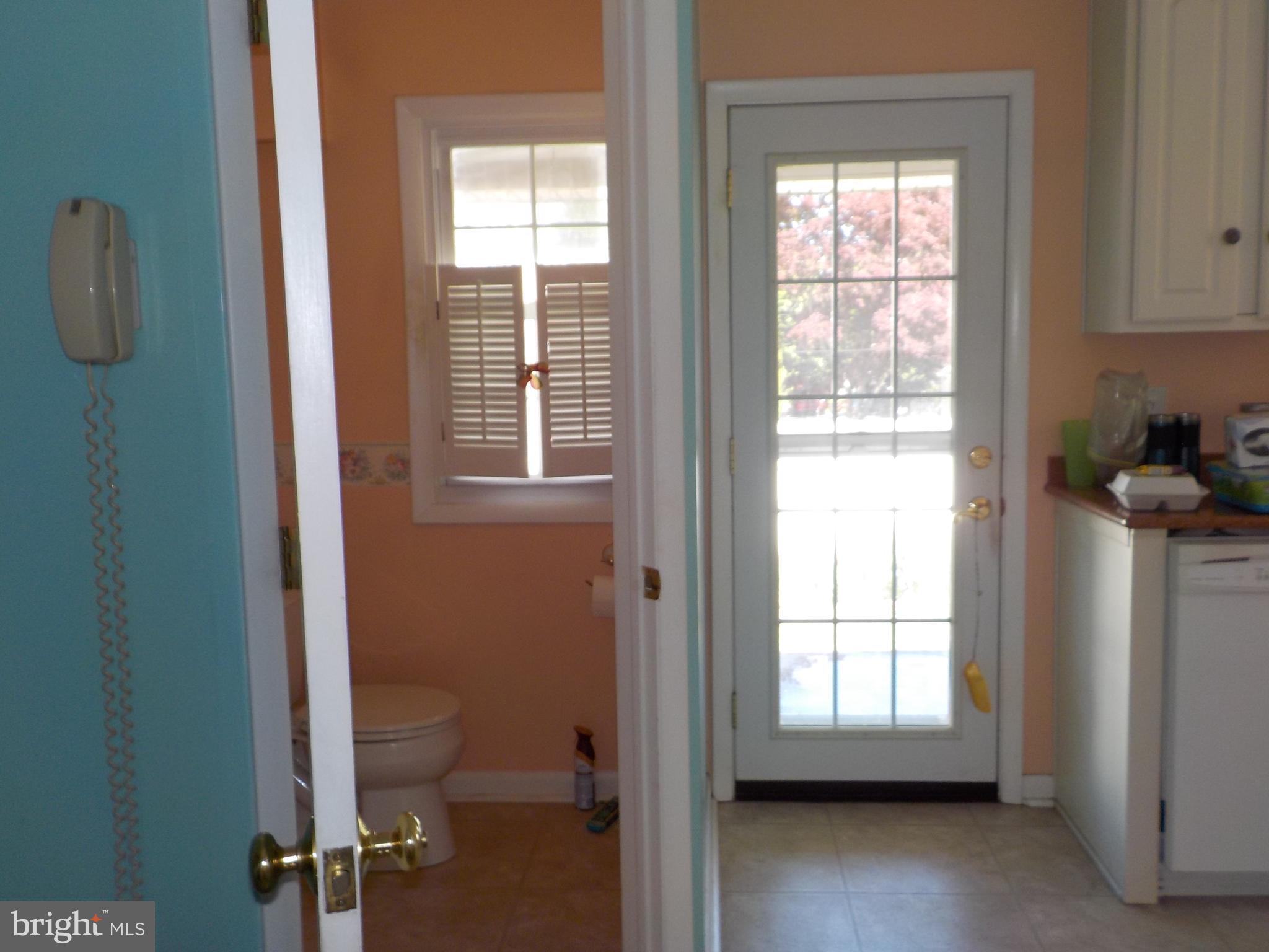 244 Williams Road Bryn Mawr, PA 19010 - Photo 11 of 40 Enter Kitchen rear door and Powder Rm