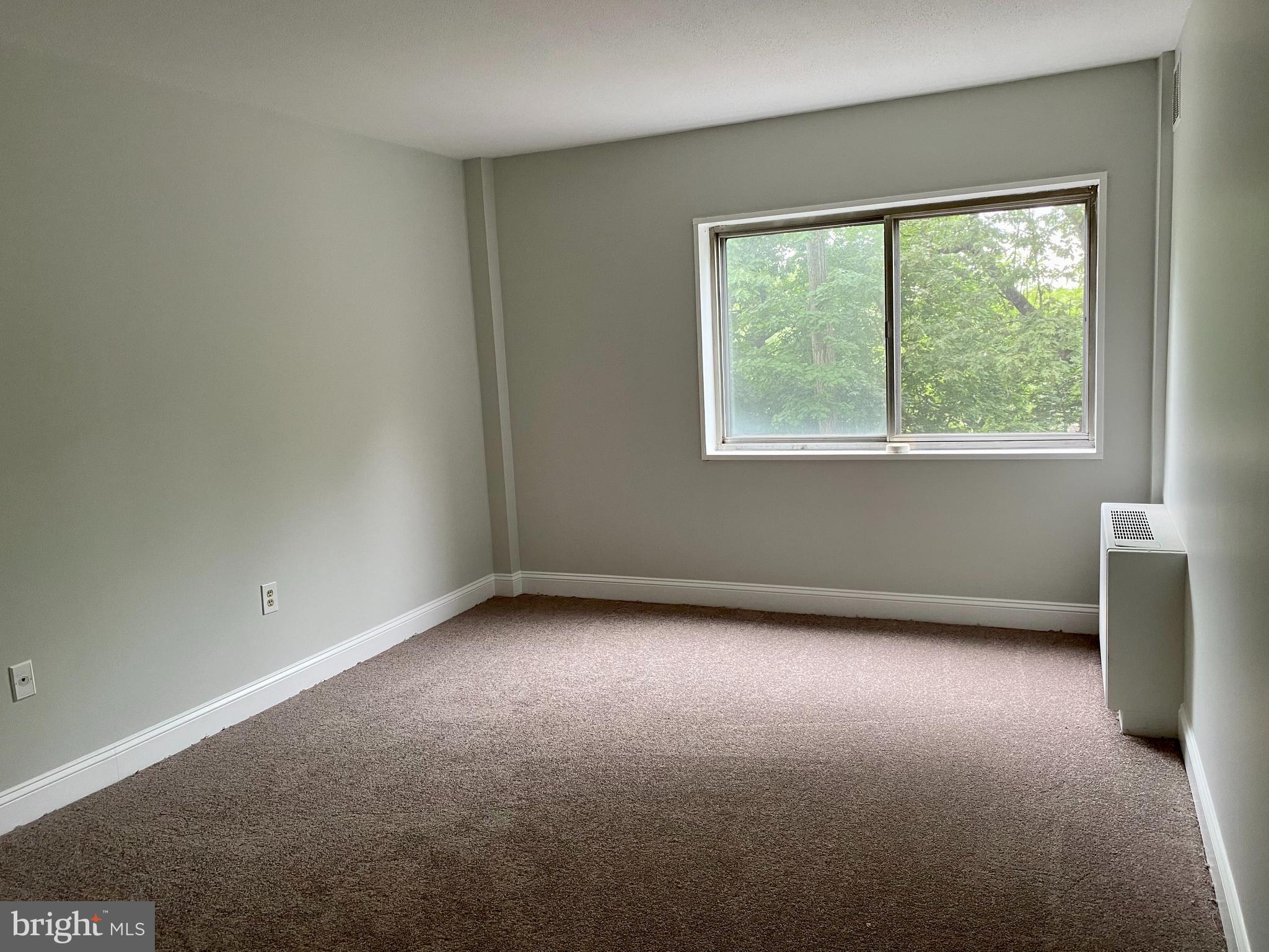 100 West Avenue, Unit 218S Jenkintown, PA 19046 - Photo 20 of 29 an empty room with a window