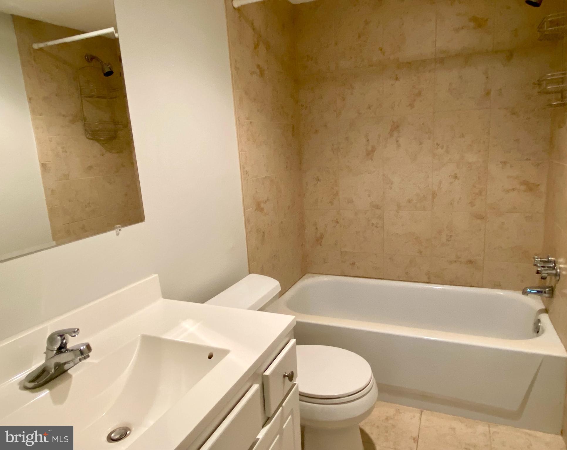 100 West Avenue, Unit 218S Jenkintown, PA 19046 - Photo 21 of 29 a bathroom with a sink and a bathtub