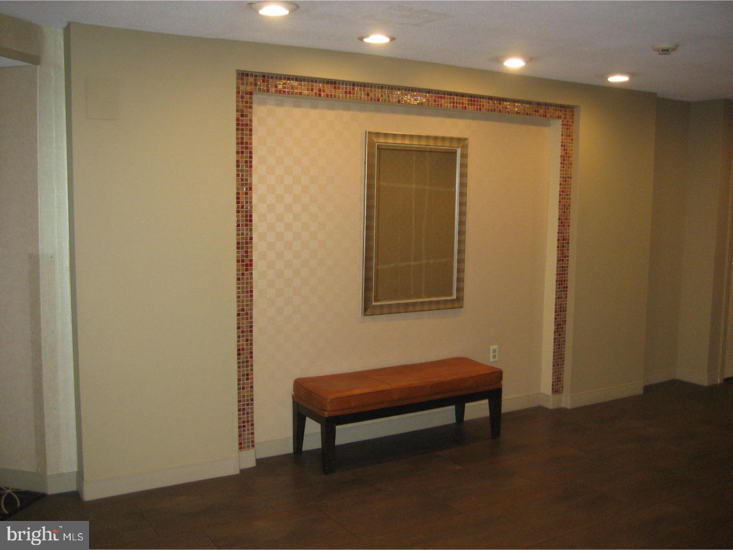 100 West Avenue, Unit 218S Jenkintown, PA 19046 - Photo 25 of 29 a view of a bench in a room