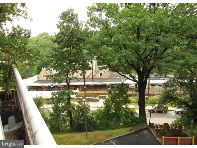 a view of swimming pool from a balcony