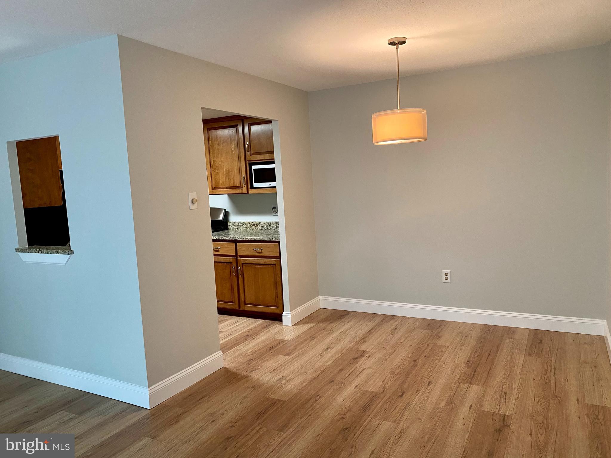 100 West Avenue, Unit 218S Jenkintown, PA 19046 - Photo 10 of 29 a view of a kitchen from the hallway
