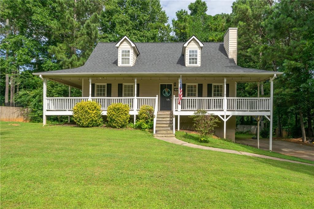 Wrap around rocking chair porch.  Master bedroom has access to porch.