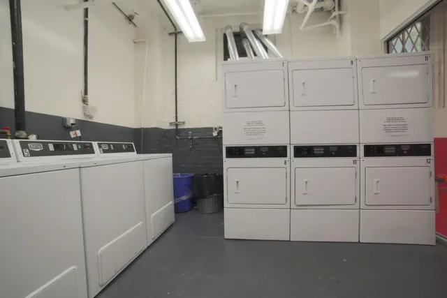 a utility room with cabinets