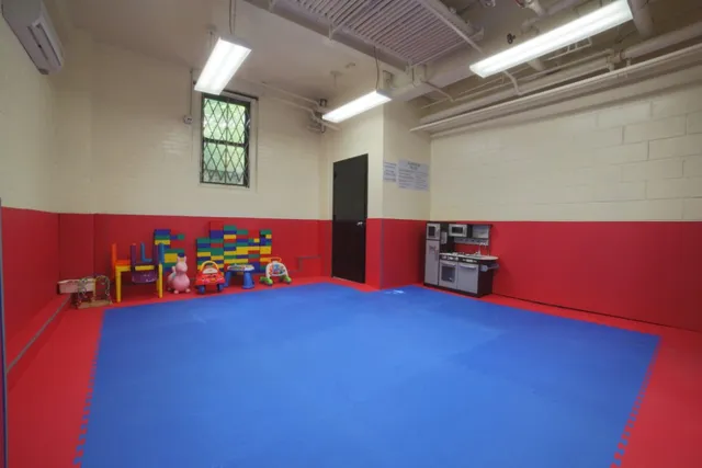 a view of an empty room with windows