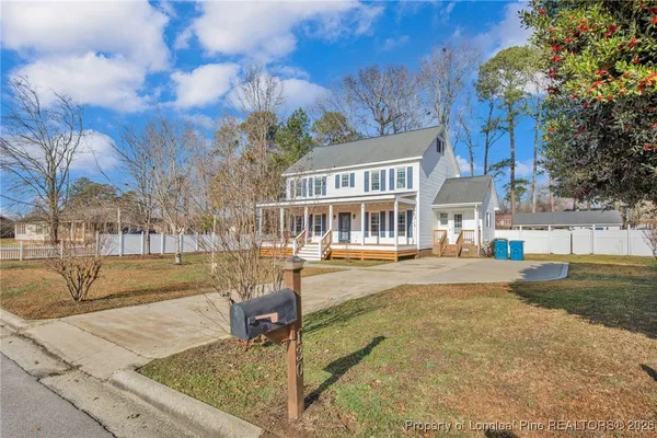 a view of a house with swimming pool