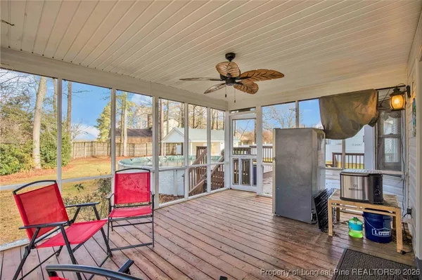 a view of roof deck with patio