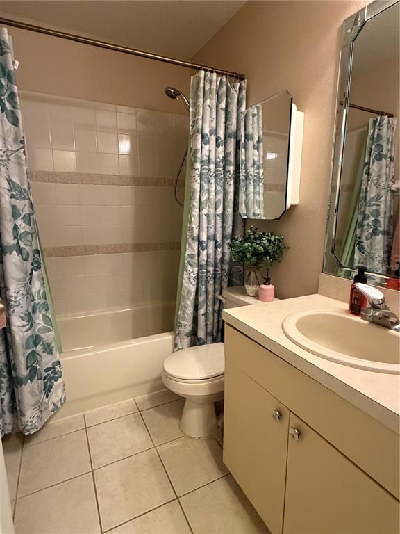 2861 Surf Drive Deltona, FL 32738 - Photo 11 of 20 a bathroom with a sink a toilet and shower