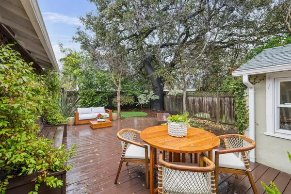 a view of a table and chairs in the patio