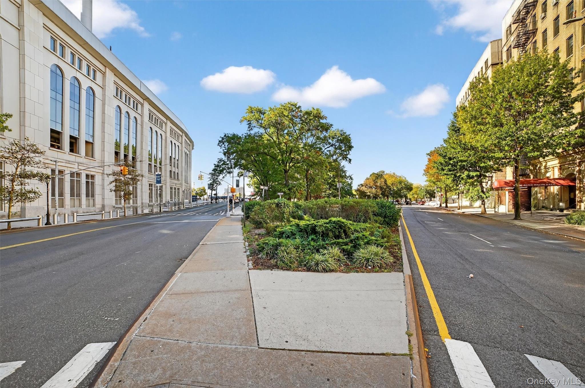 941 Jerome Avenue, Unit 8F Bronx, NY 10452 - Photo 16 of 17 a view of a street with houses
