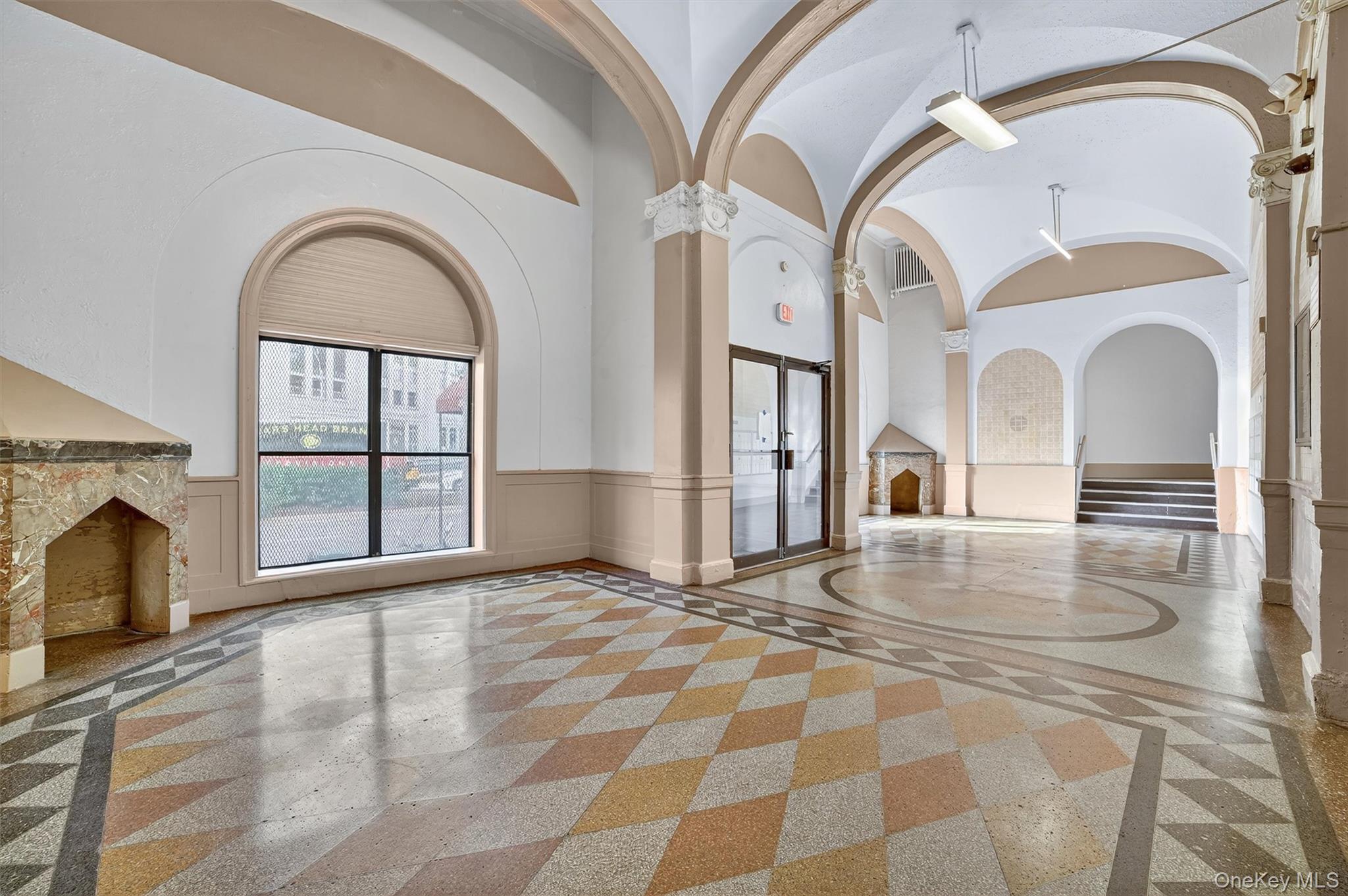 941 Jerome Avenue, Unit 8F Bronx, NY 10452 - Photo 3 of 17 a view of a livingroom with a fireplace