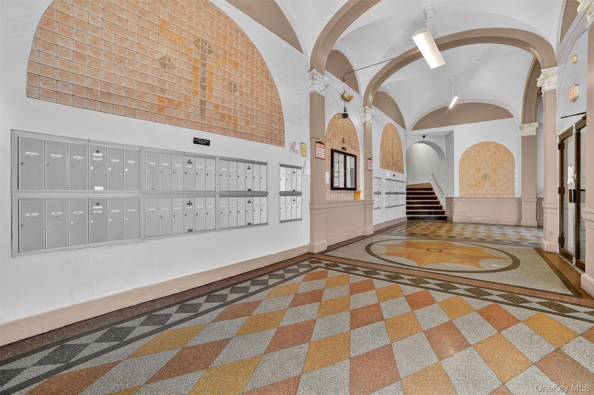 941 Jerome Avenue, Unit 8F Bronx, NY 10452 - Photo 4 of 17 a bathroom with a sink a bathtub and a shower