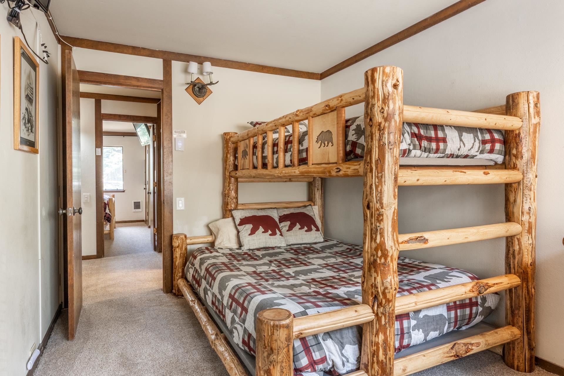 94 John Muir Road, Unit 127 Mammoth Lakes, CA 93546 - Photo 17 of 32 a bedroom with a bed next to a window