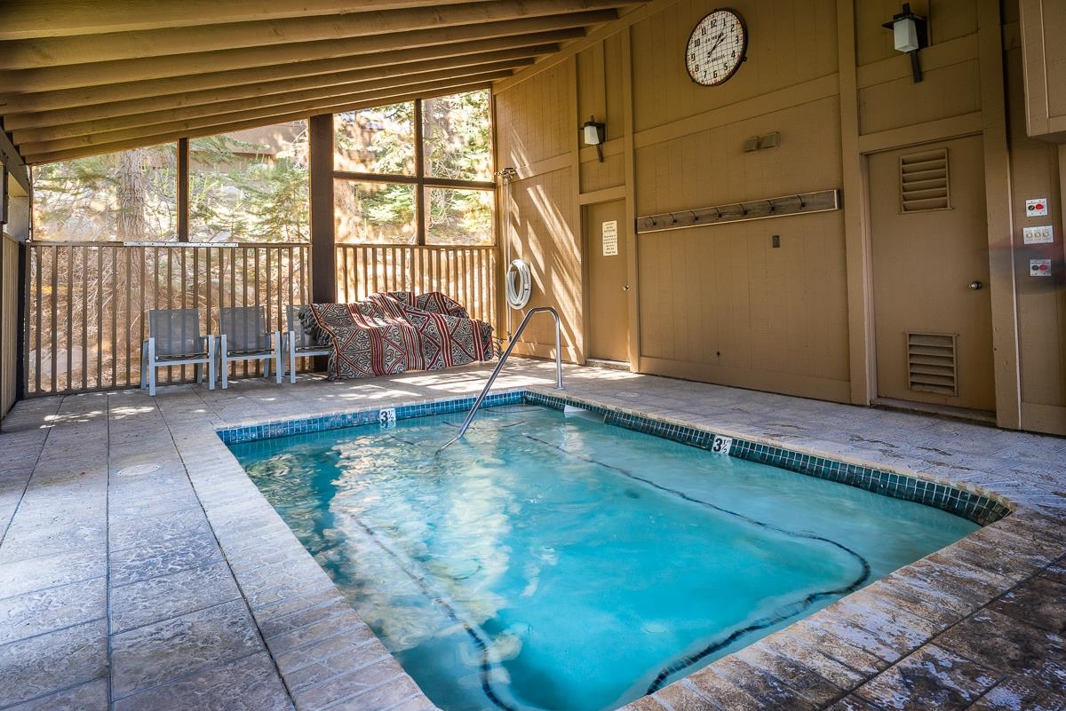 94 John Muir Road, Unit 127 Mammoth Lakes, CA 93546 - Photo 31 of 32 a view of a swimming pool with seating space