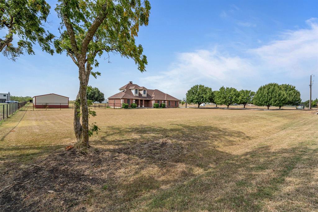 6501 Indian Trail Sanger, TX 76266 - Photo 33 of 39 View of yard with a rural view