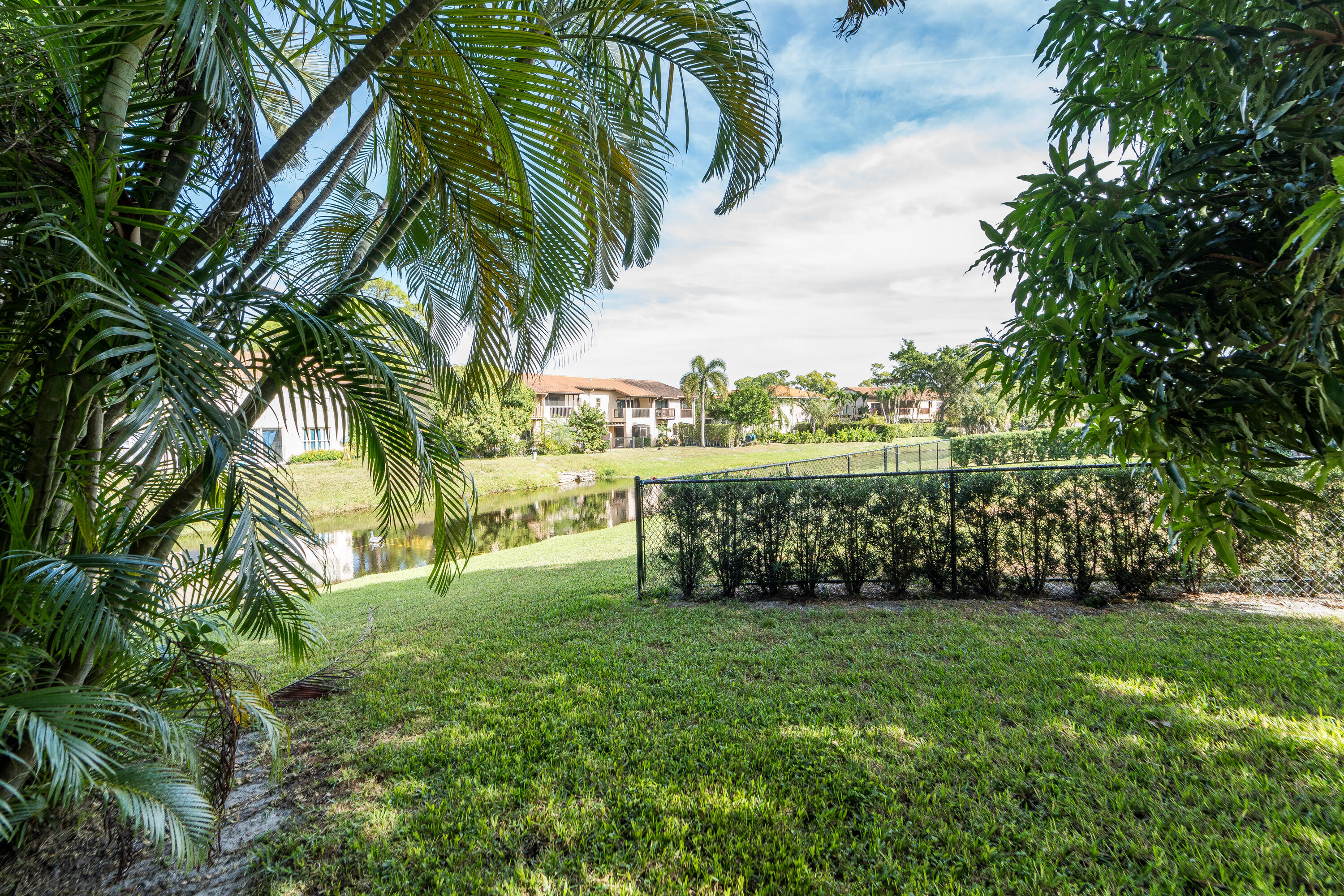13164 Quiet Woods Road, Unit B Wellington, FL 33414 - Photo 28 of 48 Pretty water view